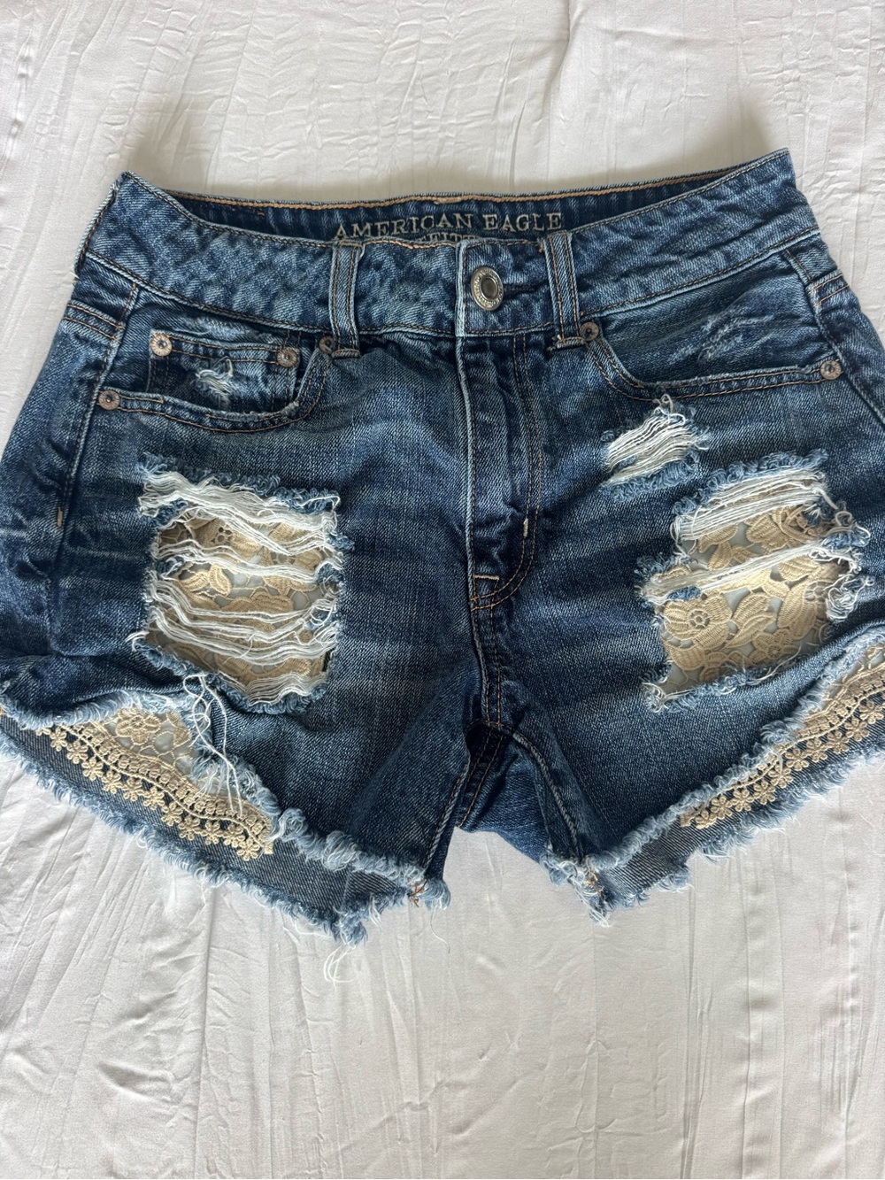 Women’s American Eagle Outfitters Blue Distressed Denim Shorts with Cream Lace